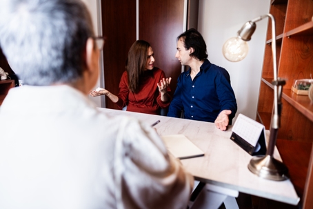 couple arguing in law office