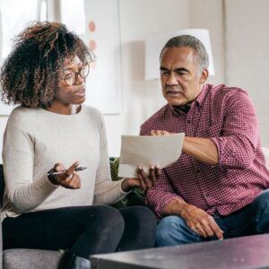 couple reviewing assets