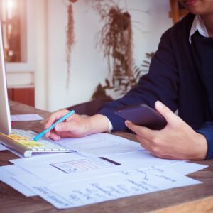 Man writing on a notepad