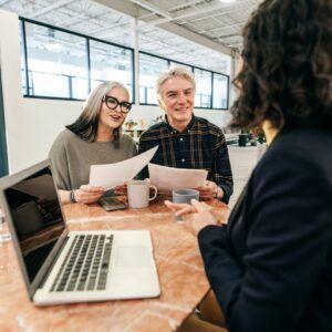 couple talking with lawyer